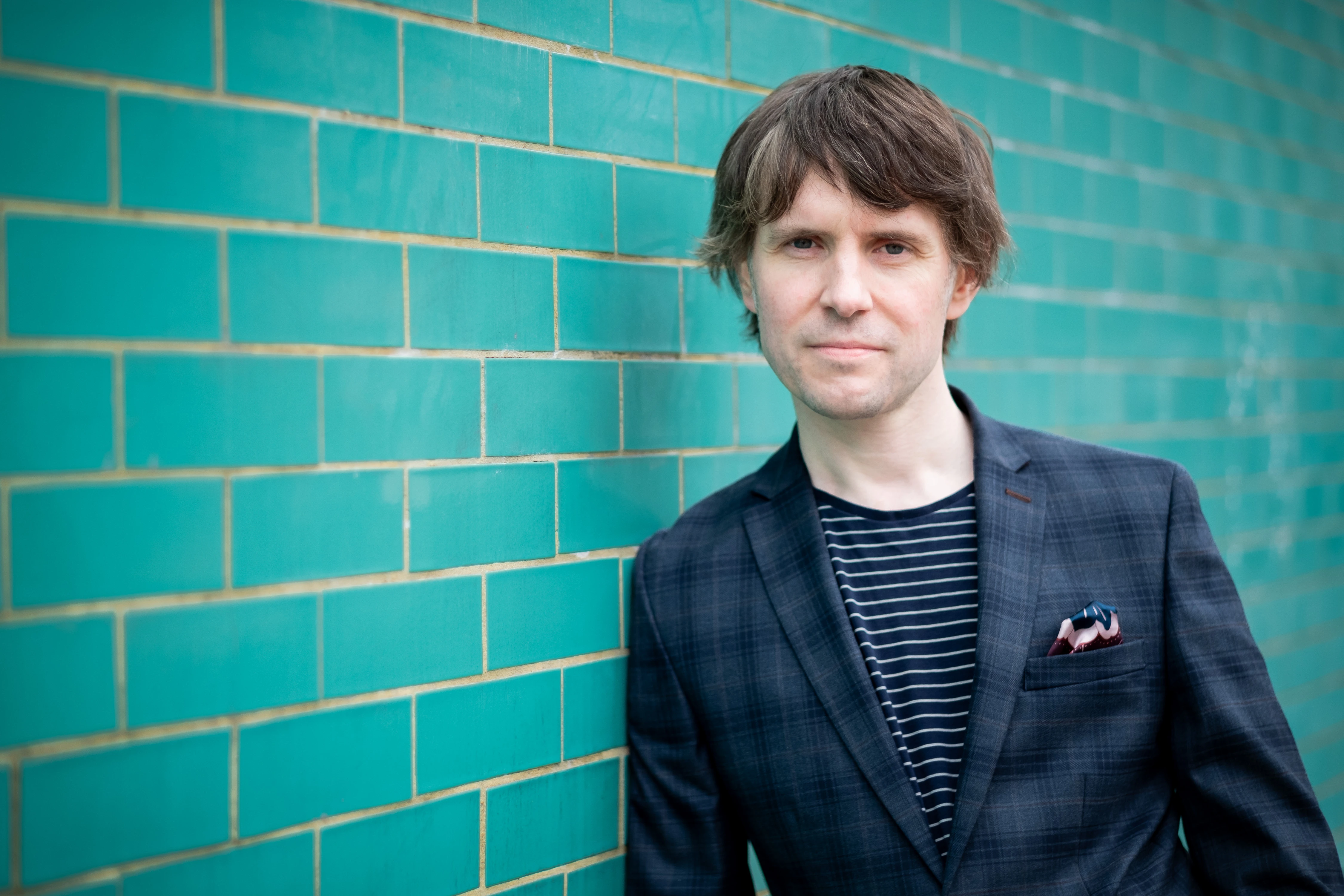 Martin Bryant Personal Branding Headshots - Candid moment against greenery