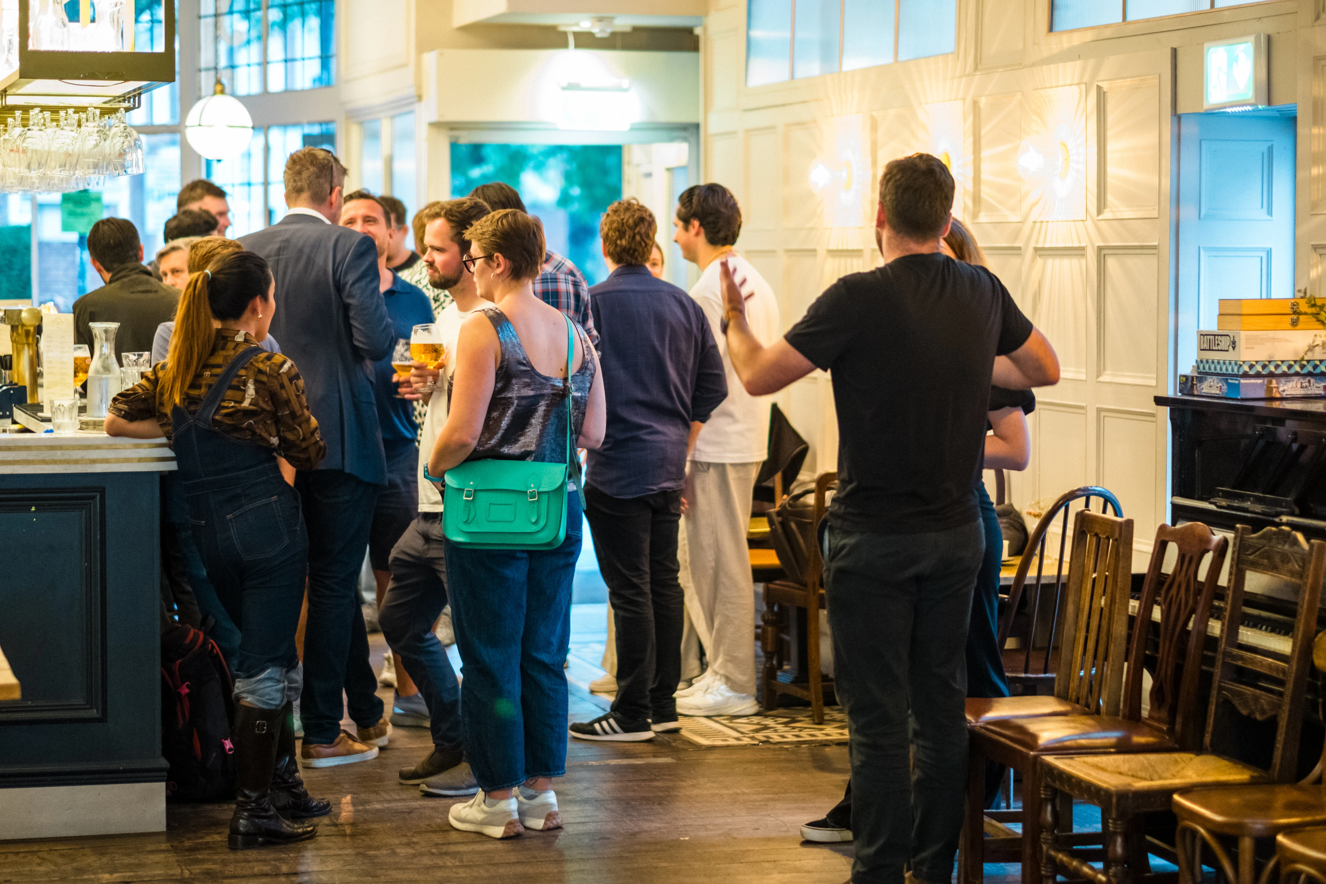 Planet A Ventures Meetup London - Wide view of the pub floor, guests gathered along the bar