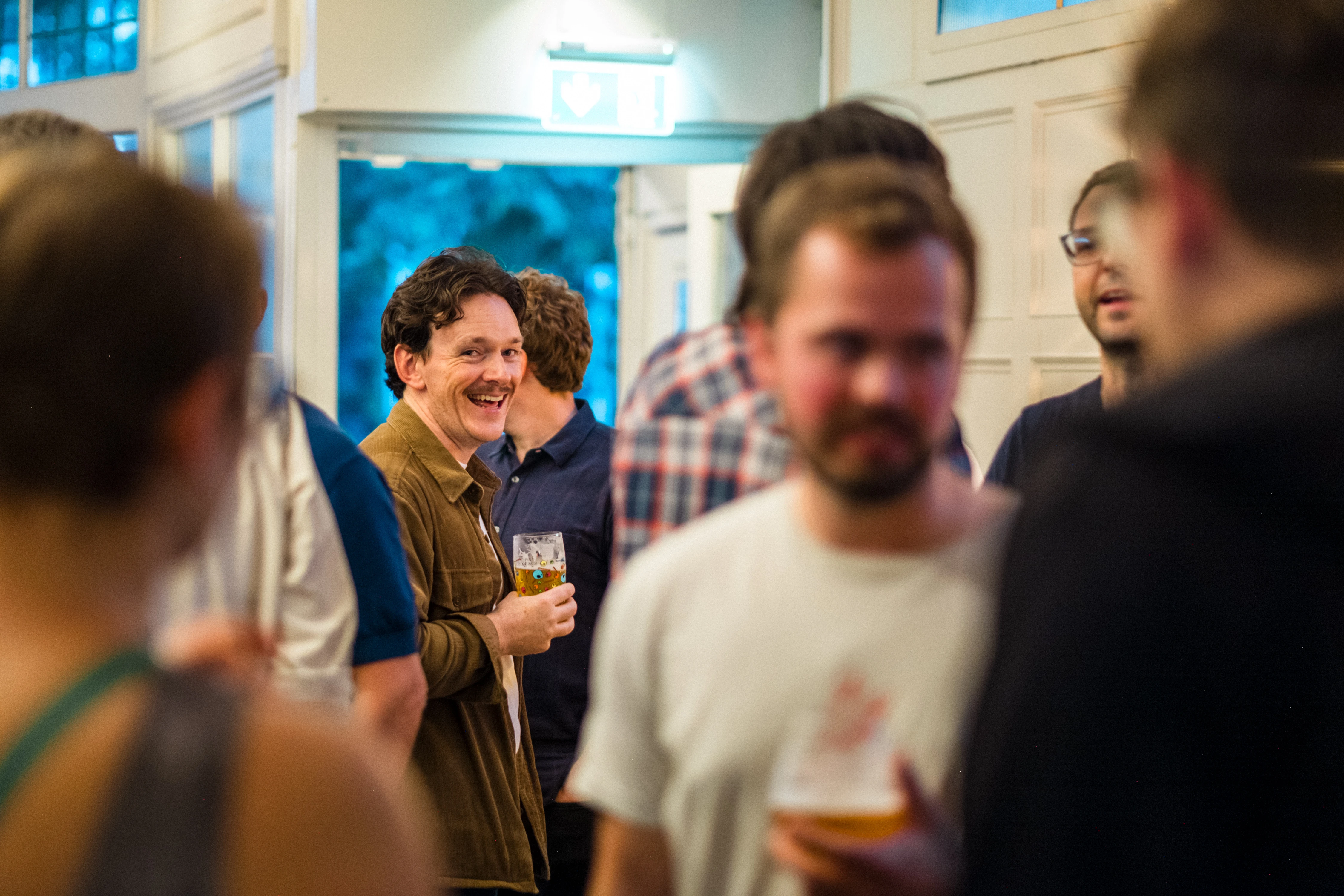Planet A Ventures Meetup London - Guest caught laughing as the room fills up
