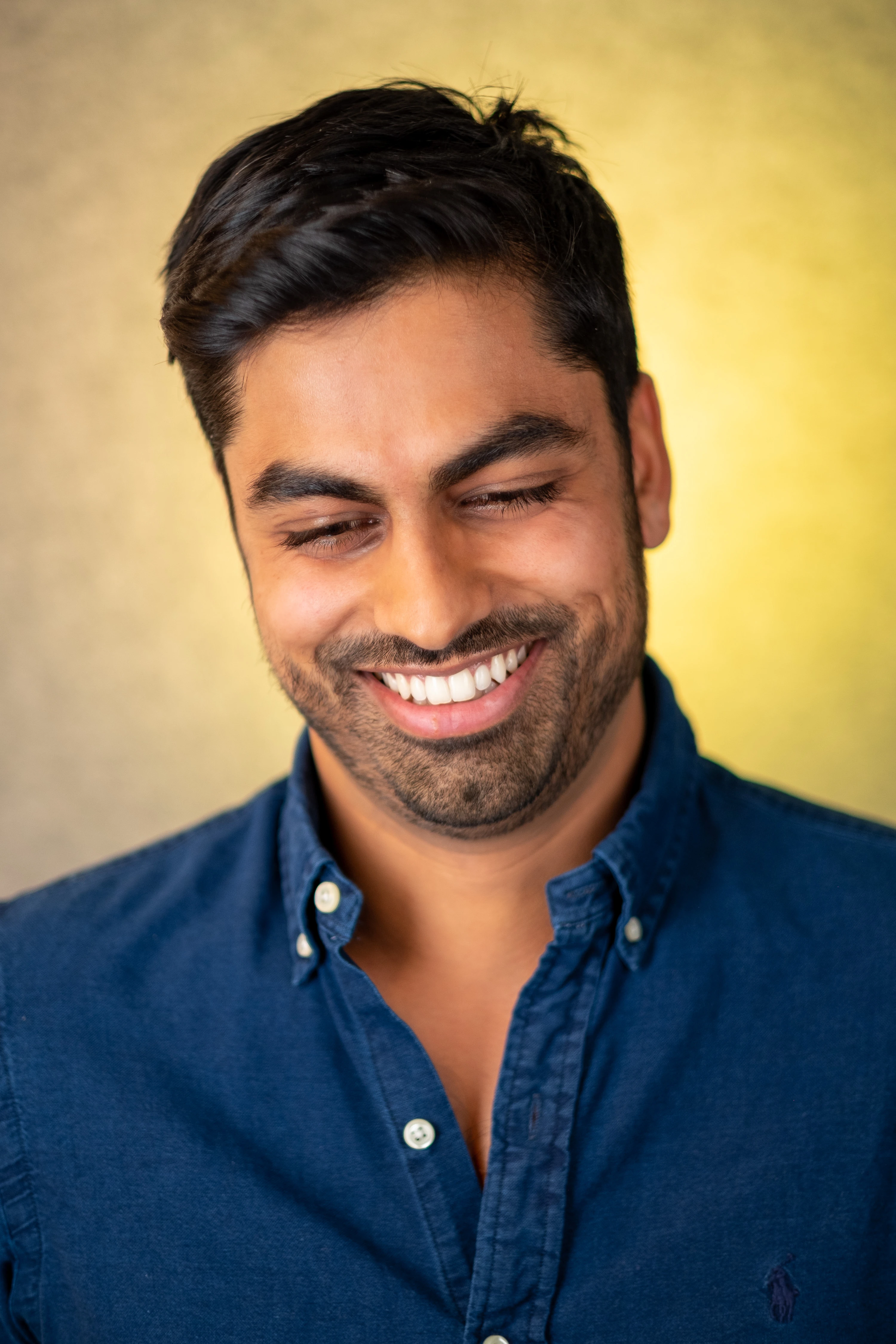 Thrasio Executive Headshots - Anup Desai, candid expression, warm backdrop