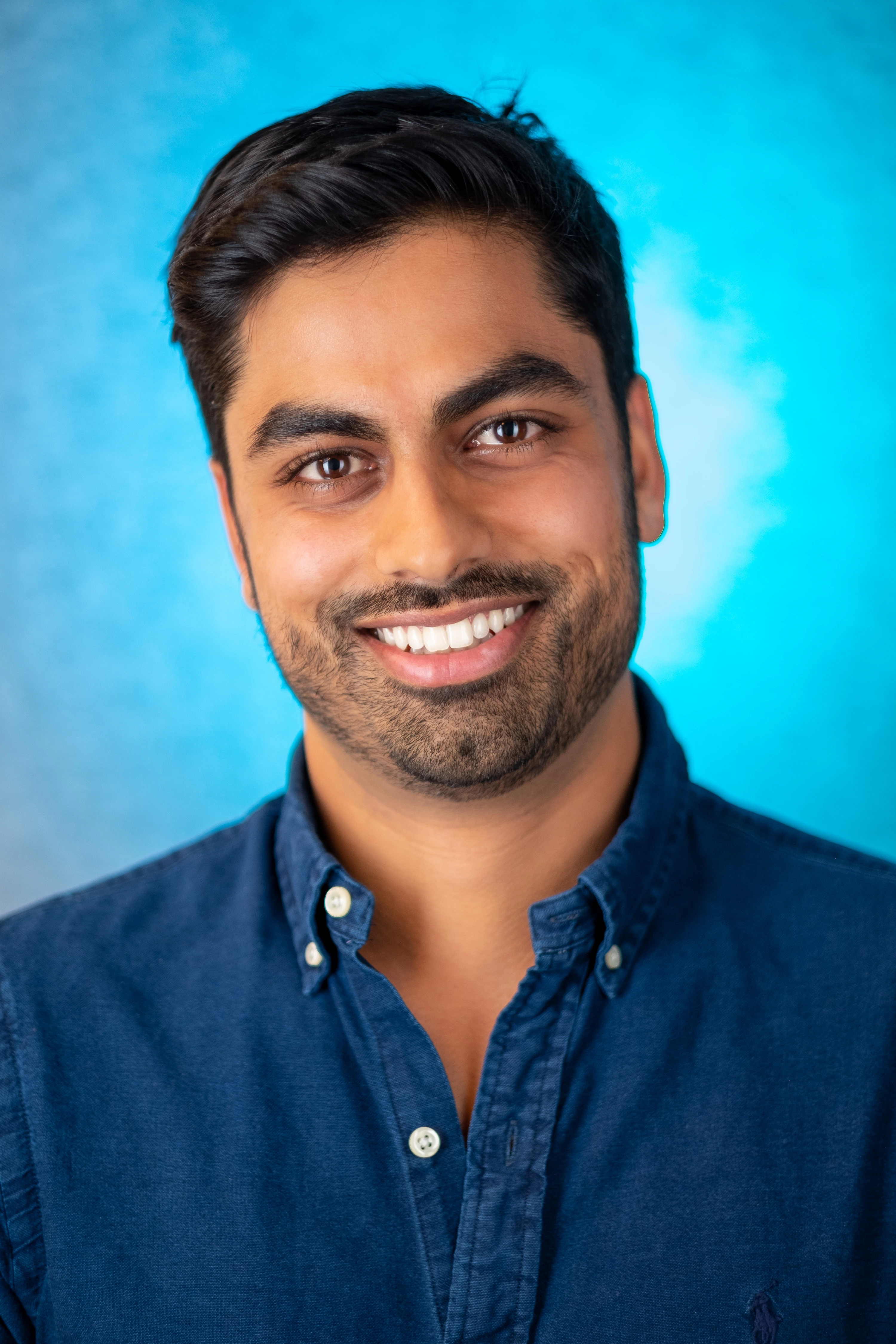 Thrasio Executive Headshots - Anup Desai, direct portrait, warm backdrop
