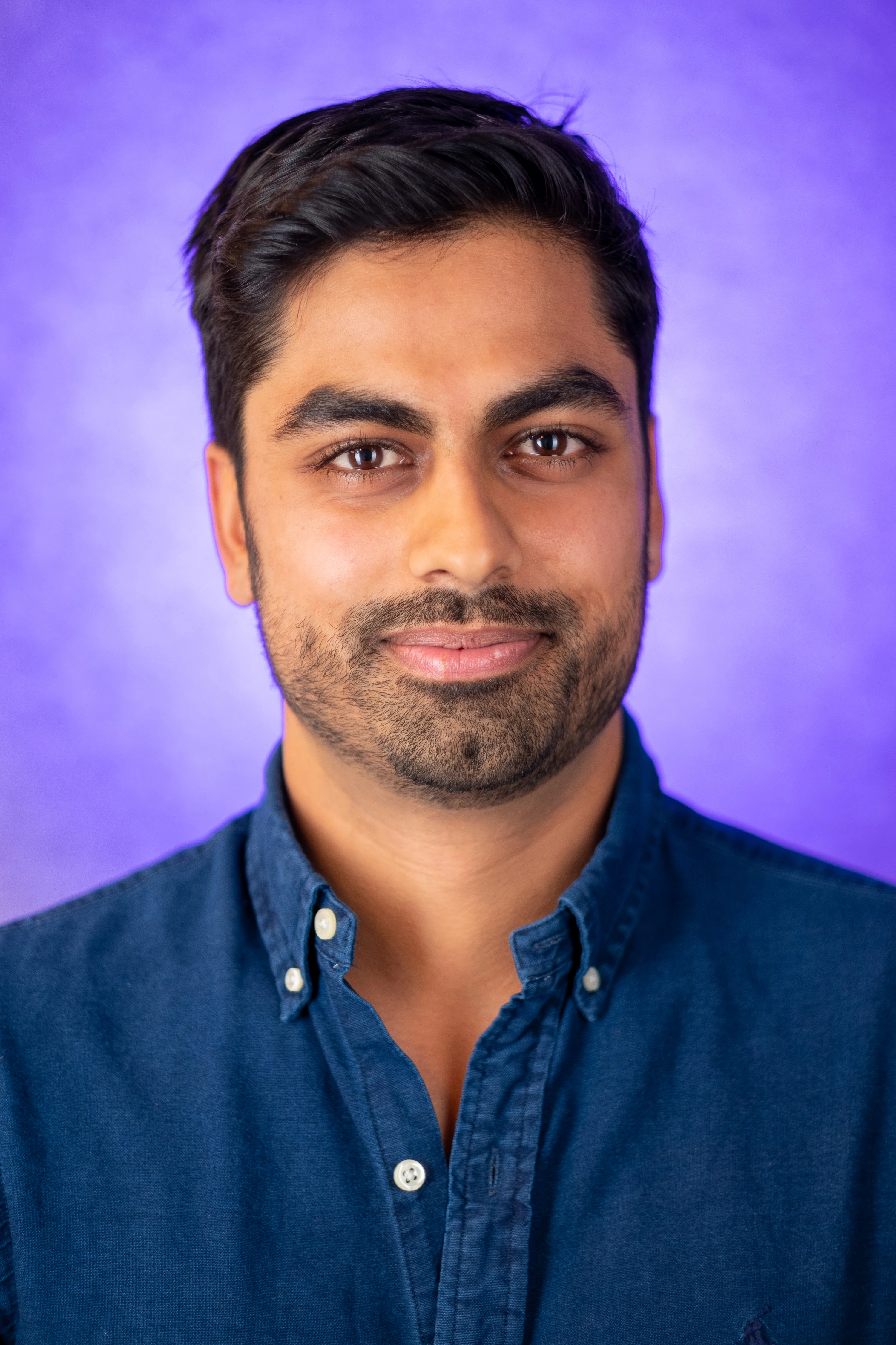 Thrasio Executive Headshots - Jim Mann, Director of Acquisitions, blue backdrop, direct portrait